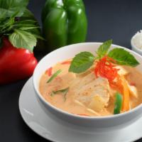 37. Red Curry · Gluten-free. Red curry sauce with coconut milk, bamboo shoot, bell pepper, and sweet Thai ba...