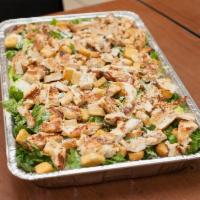 Grilled Chicken Caesar Salad · Romaine lettuce, grilled chicken, seasoned croutons and Parmesan cheese.
