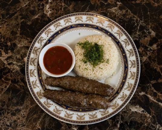 Adana Kebab · Ground beef with red pepper and seasonings, served with salad or rice.