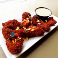 Bedrock Bites · Hand-cut chicken breast nuggets breaded with gluten-free breadcrumbs and Fruity Pebbles cere...