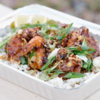 Garlic Shrimp · Fried shrimp (shell-on) in our signature butter garlic sauce over garlic fried rice with cri...