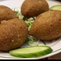Kibbeh Ball  · Made of bulgur and chopped meat and onion. (Sold by the piece)