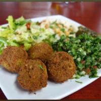 Falafel plate · A combination platter of falafel, hummus, baba ghanoush, tabouleh, and more. Plate.