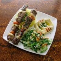 Beef & Lamb Kabob · Filet mignon or lamb seasoned with our special blend of spices served with side salad, hummu...