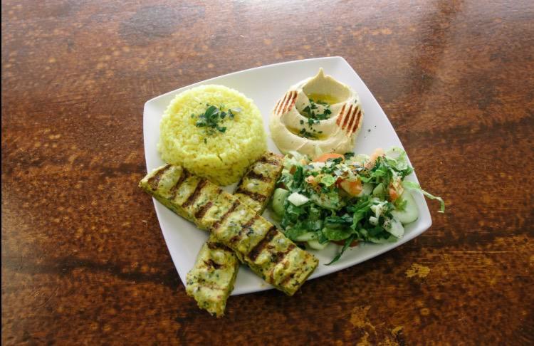 Lula Chicken Kabob · Ground chicken seasoned with our special blend of spices served with side salad, hummus, pita bread and choice of rice or fries.
