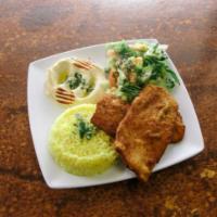 Schnitzel · Breaded chicken breast served golden brown with a side of salad, hummus, pita bread, and you...