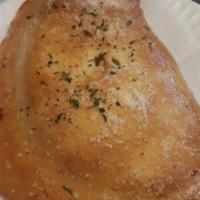 Calzone  · Ricotta cheese and mozzarella cheese. Add toppings for an additional charge.