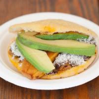 Pabellón Arepa · Stuffed with shredded beef, black beans, cotija cheese, avocado, and plantain.
