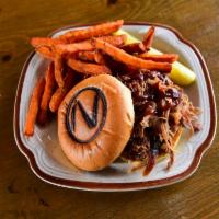 Nashville's Pulled Pork Sandwich · Our slow cooked pulled pork piled high on a roll slathered with bourbon BBQ sauce.