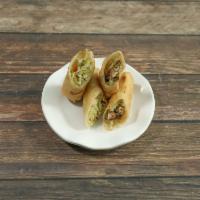 1. Spring Rolls · 2 pieces. Vegetable.