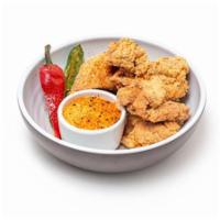 SoCal Chicken Karaage · Lightly-dusted and fried chicken thigh with blistered serrano and fresno peppers. Served wit...
