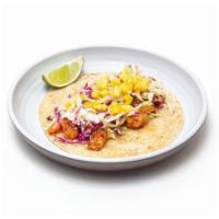 Del Mar Shrimp Taco · Seasoned and grilled shrimp, mango, napa slaw, avocado smash, micro greens on a corn tortilla.