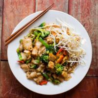 Pad Kee Mao (Drunken Noodles) · Pan-fried wide rice noodles stir-fried with a house chili and garlic sauce, Thai basil leave...