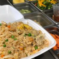67. Thai Fried Rice · The classic Thai style fried rice cooked in our house sauce with Chinese broccoli, onion, to...