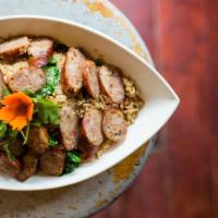 72.	Thai Sausage Fried Rice · Fried rice with seasoned grilled pork sausage (Sai Ua) cooked with carrot, Chinese broccoli,...