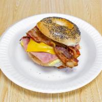 Deli Buster Sandwich · Eggs, bacon, ham, pork roll and cheese.