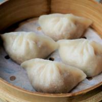 Beef Dumpling · Steamed or pan fried. (4 pcs)