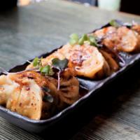 Spicy Szechuan Dumpling · pork.  (5 pcs)