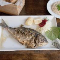 Tsipoura · Porgy fish with a mild, light flavor. Freshly caught whole fish charcoal grilled and drizzle...