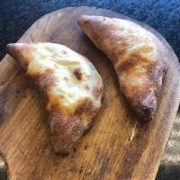 Calzone · Riccotta and cheese.