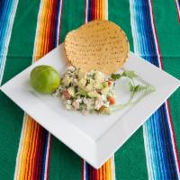 Ceviche · Tilapia and shrimp mixed with tomato,green jalapeño, onion, and cilantro cooked in salt and ...