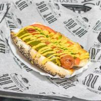 Chicago Dog · Grilled 100% certified Angus beef hot dog topped with tomatoes, sport peppers, sweet relish,...