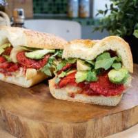 Venetto Sandwich · Roasted peppers, avocado, artichokes, sun dried tomatoes, arugula and house dressing. Vegeta...