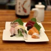 39. Sashimi · 7 pieces. 2 tuna, 2 salmon, 2 fluke, 1 seabass 