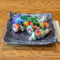 R61. S-Bomb Roll · Salmon, avocado, rainbow tobiko on the outside and spicy tuna, shrimp tempura wrap inside.