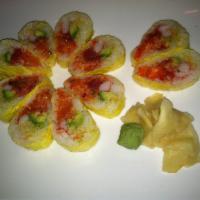 R66. Spicy Girl Roll · 10 pieces. Spicy salmon, tuna, yellowtail, avocado, tobiko, kani, crunch inside with seaweed...