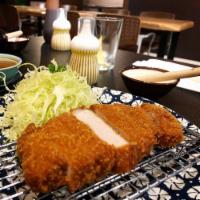 65. Tonkatsu · Deep-fried pork with katsu sauce. Served with rice and miso soup or green salad.