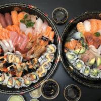 Sushi Party D · 12 pieces of sushi or sashimi of chef's choice and any 13 rolls.