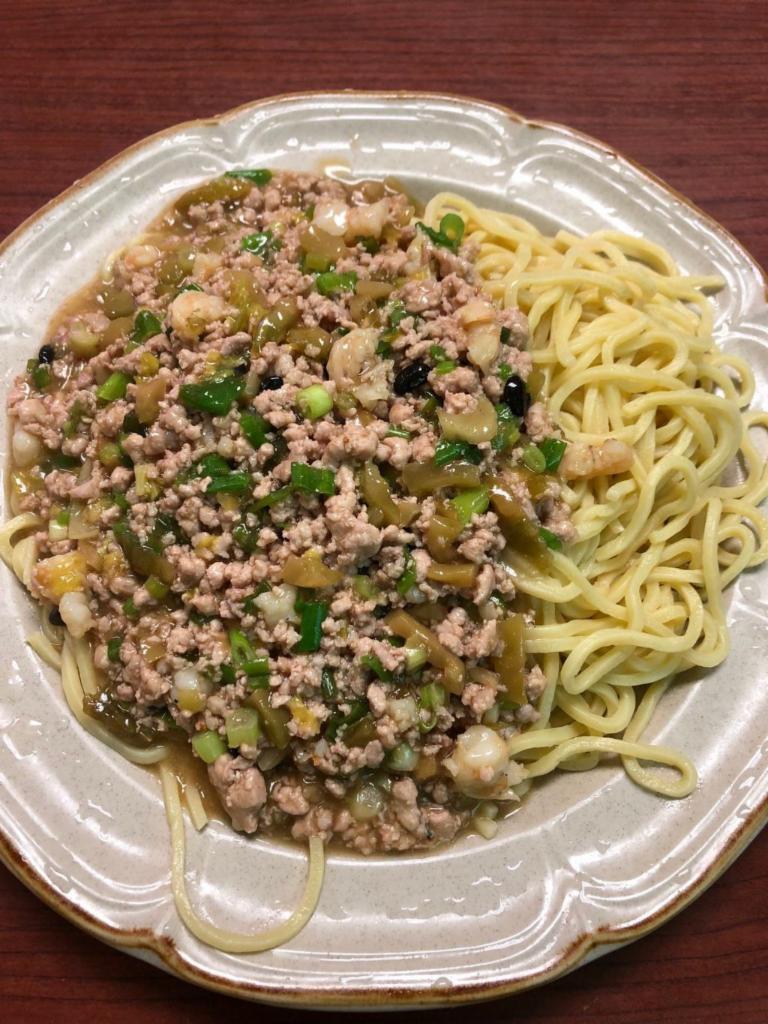 S12. Spaghetti with Chopped Meat Sauce · Comes with Chinese styled noodles, homemade meat sauce, celery, and chinese radish. 