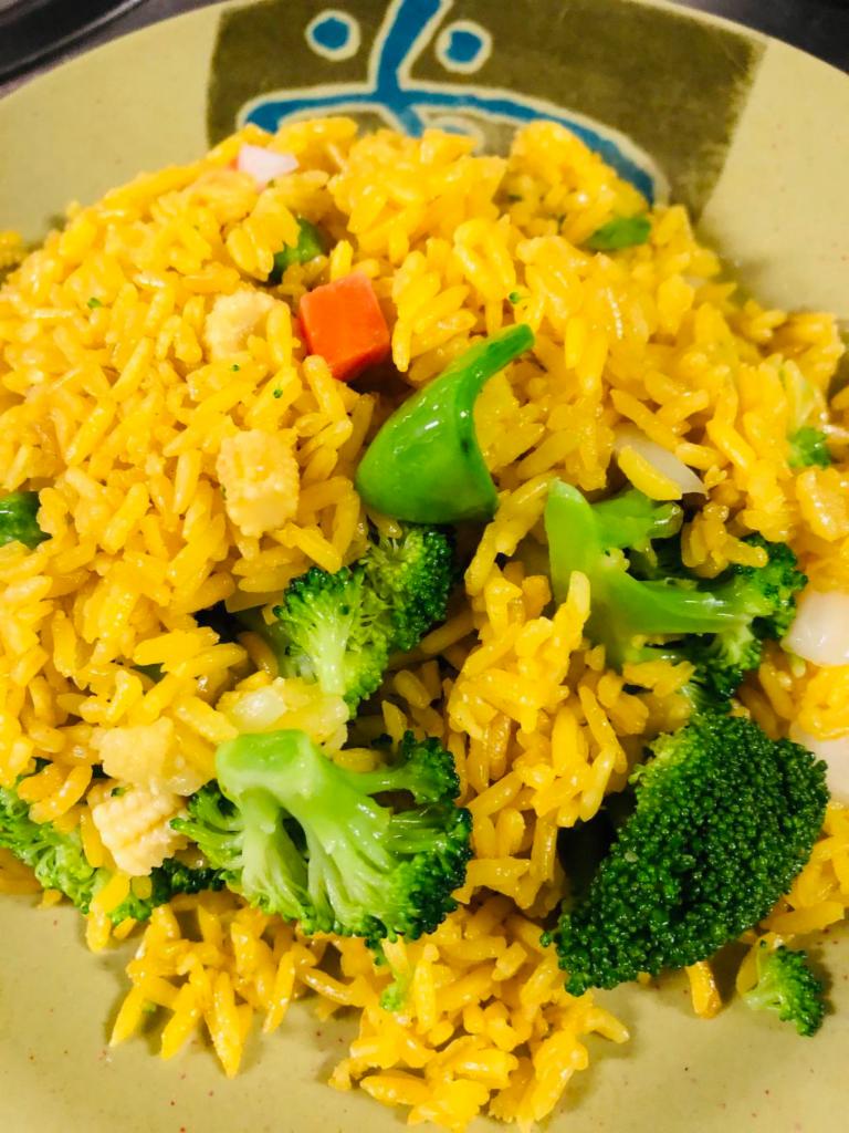27. Vegetable Fried Rice · Stir fried rice. 
