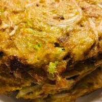 51. Roast Pork Egg Foo Young · Comes with gravy sauce on the side. 