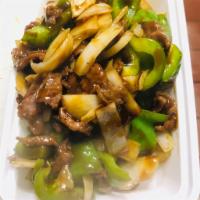 108. Pepper Steak with Onion · Stir fried steak with vegetables and a savory sauce.