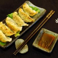 6 Gyoza · Japanese pan-fried dumpling. 
