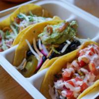 Create Your Own Tacos · Three hard or soft shell tacos.