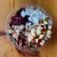 Warm Winter Salad Bowl · Organic mesclun mix, organic quinoa, warm roasted chicken, sun-dried cranberries, candied pe...