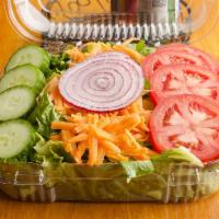 Tossed Salad · Mixed greens with tomatoes, cucumbers, onions and carrots.