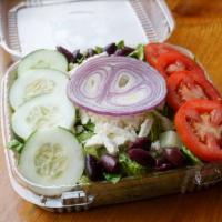 Greek Salad · Crumbled feta cheese, Greek olives, Roma tomatoes, red onions and cucumbers over crisp romai...