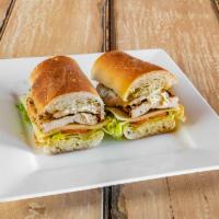 Brooklyn Sandwich · Grilled chicken, Monterey Jack cheese, tomato, romaine lettuce and pesto mayonnaise in frenc...