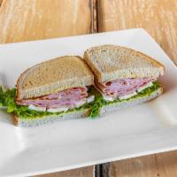 Long Island Sandwich · Black forest ham, Brie, romaine, lettuce and honey mustard on rye bread.