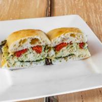 Throgs Neck Sandwich · Pesto chicken salad with mesclun greens and sun-dried tomatoes on focaccia.