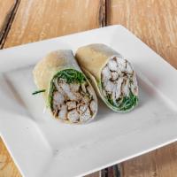 Grilled Chicken Caesar Wrap · Grilled chicken, romaine lettuce, shredded Parmesan and Caesar dressing.