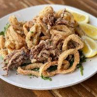Crispy Fried Calamari (GF) · Floured squid tubes and tentacles, flash fried and served with sweet chili, Thai basil yoghu...