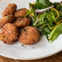 Corn And Jalapeno Fritters (GF) · Fritters of corn made with jalapeño, red onion, Manchego cheese and fresh herbs (gluten free...