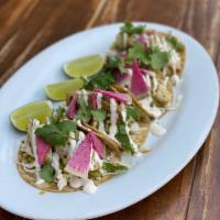 Fish Tacos  (GF) · Artisanal corn tortillas, fresh cabbage, pico de gallo, avocado, daikon, house made aioli, c...