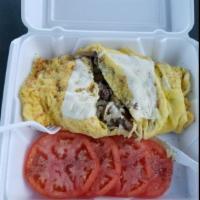 6. Steak and Cheese Omelette · Served with homefries and toast.