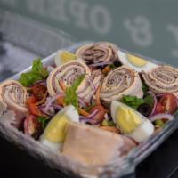 Chefs Salad · Romaine lettuce with roast beef ham, turkey and Swiss pinwheel tomato, onions, cucumber and ...